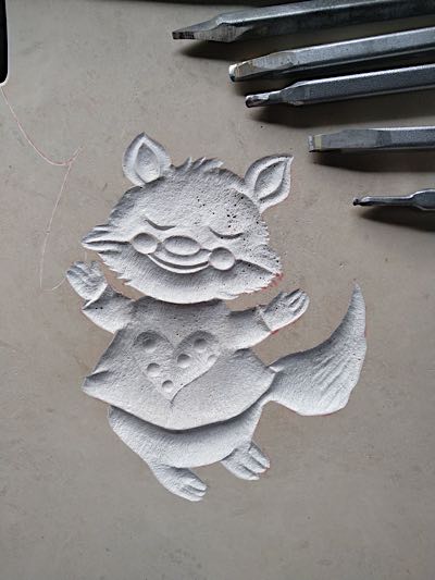 Ornament mit strukturierter Oberfläche